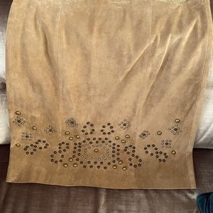 Suede skirt with gold grommet detail